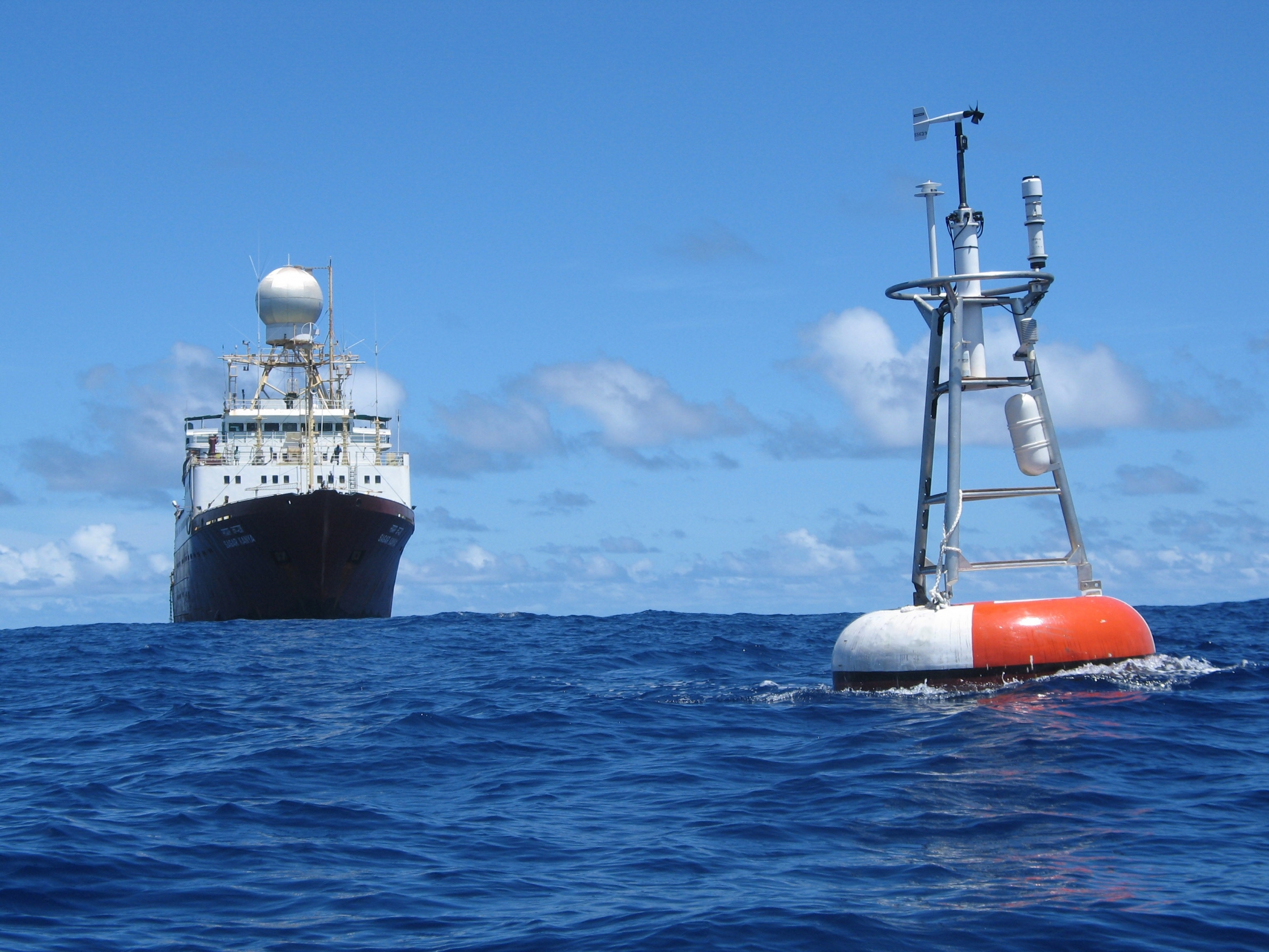 Ocean Research Vessel Sagar Kanya and an Atlas bouy. (Photo Credit: NOAA)