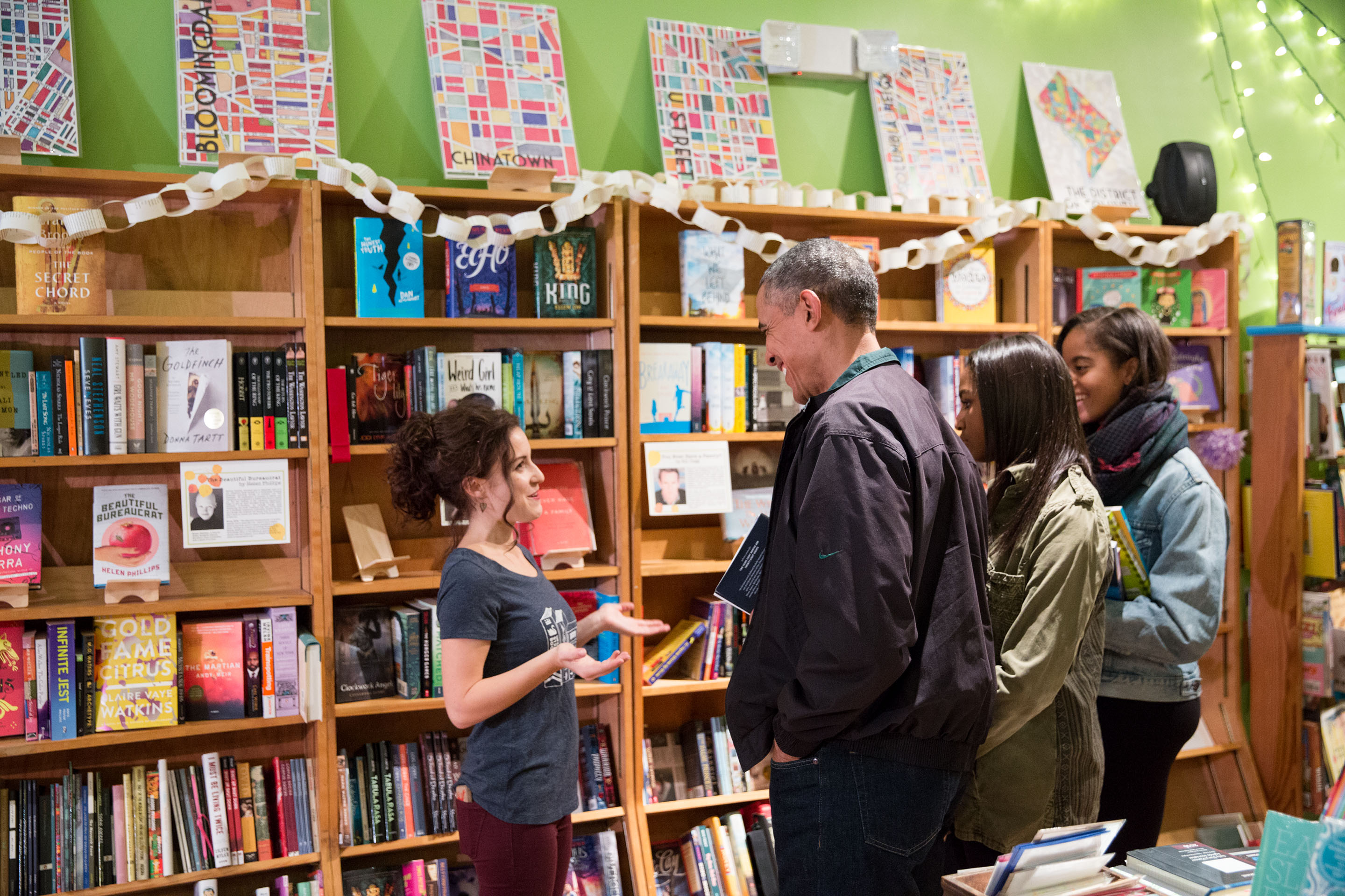 President Barack Obama, with daughters Malia and Sasha, shop for books at Upshur Street Books in Washington, D.C., on Small Business Saturday, Nov. 28, 2015.  (Official White House Photo by Pete Souza)