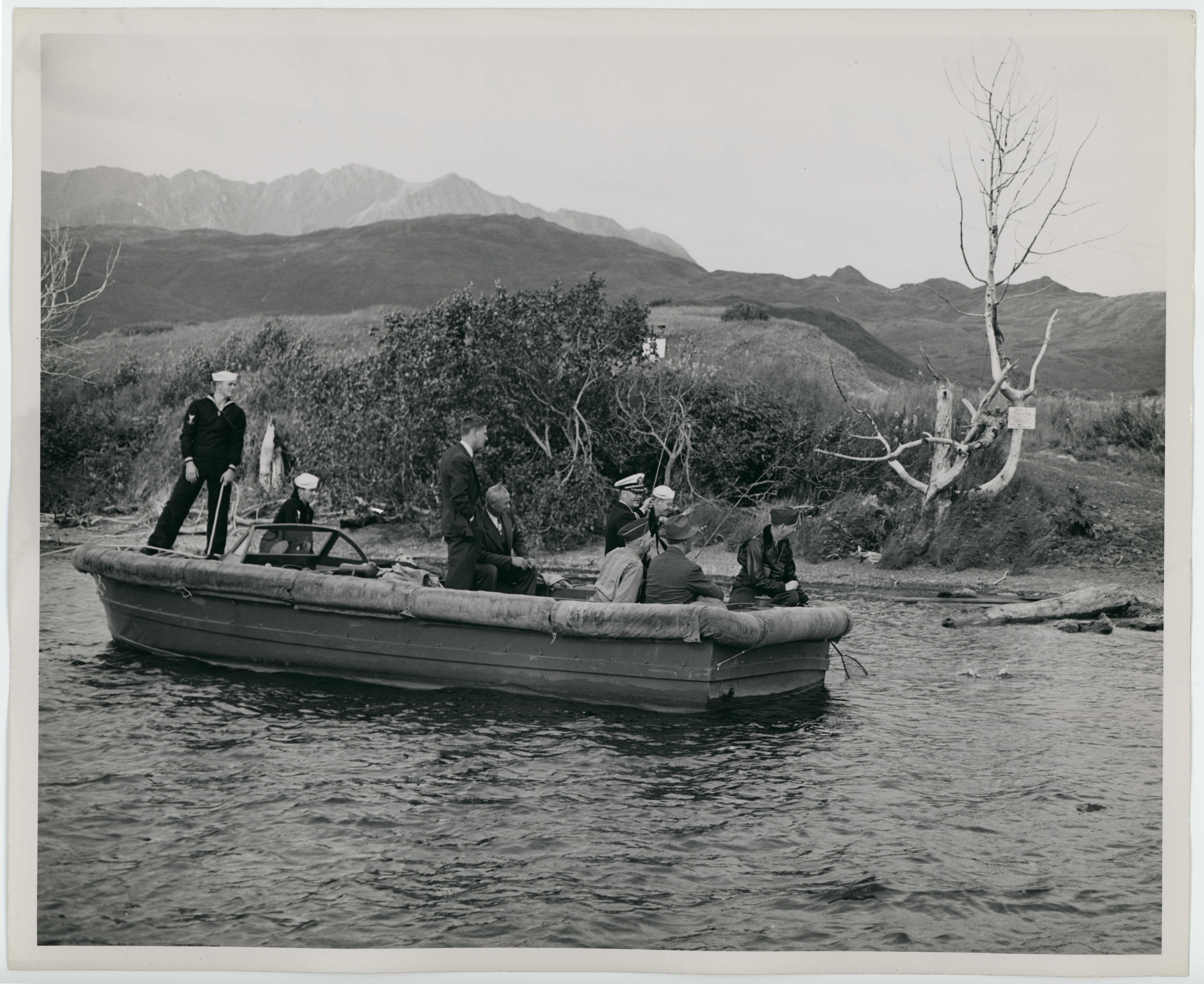 President Roosevelt and his party embark on a trout fishing expedition on Buskin Lake, Kodiak Island, Alaska, August  7, 1944.